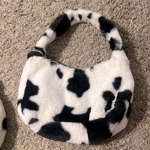 Cow print fuzzy purse